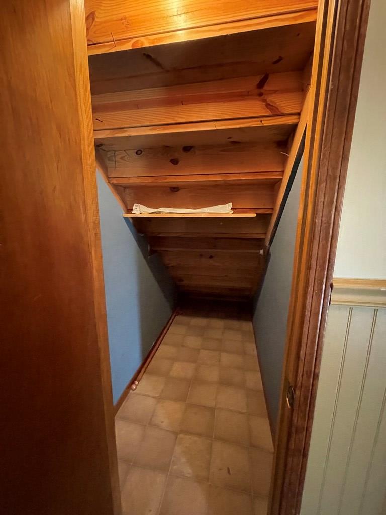 closet under the stairs for extra storage 